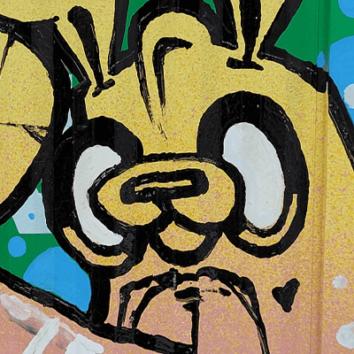 Close-up detail of Poser's Spray Bunny character and hand-painted scenery
